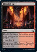 2023 Magic: The Gathering: March of the Machine (MOM) - Bloodfell Caves (#267, Common) (, Near Mint)